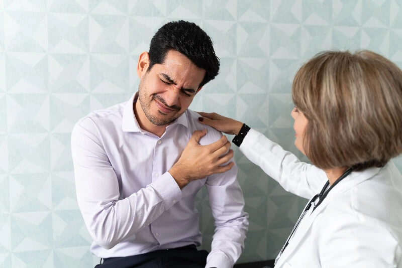 A man with shoulder pain in need of a cortisone injection in North Dallas